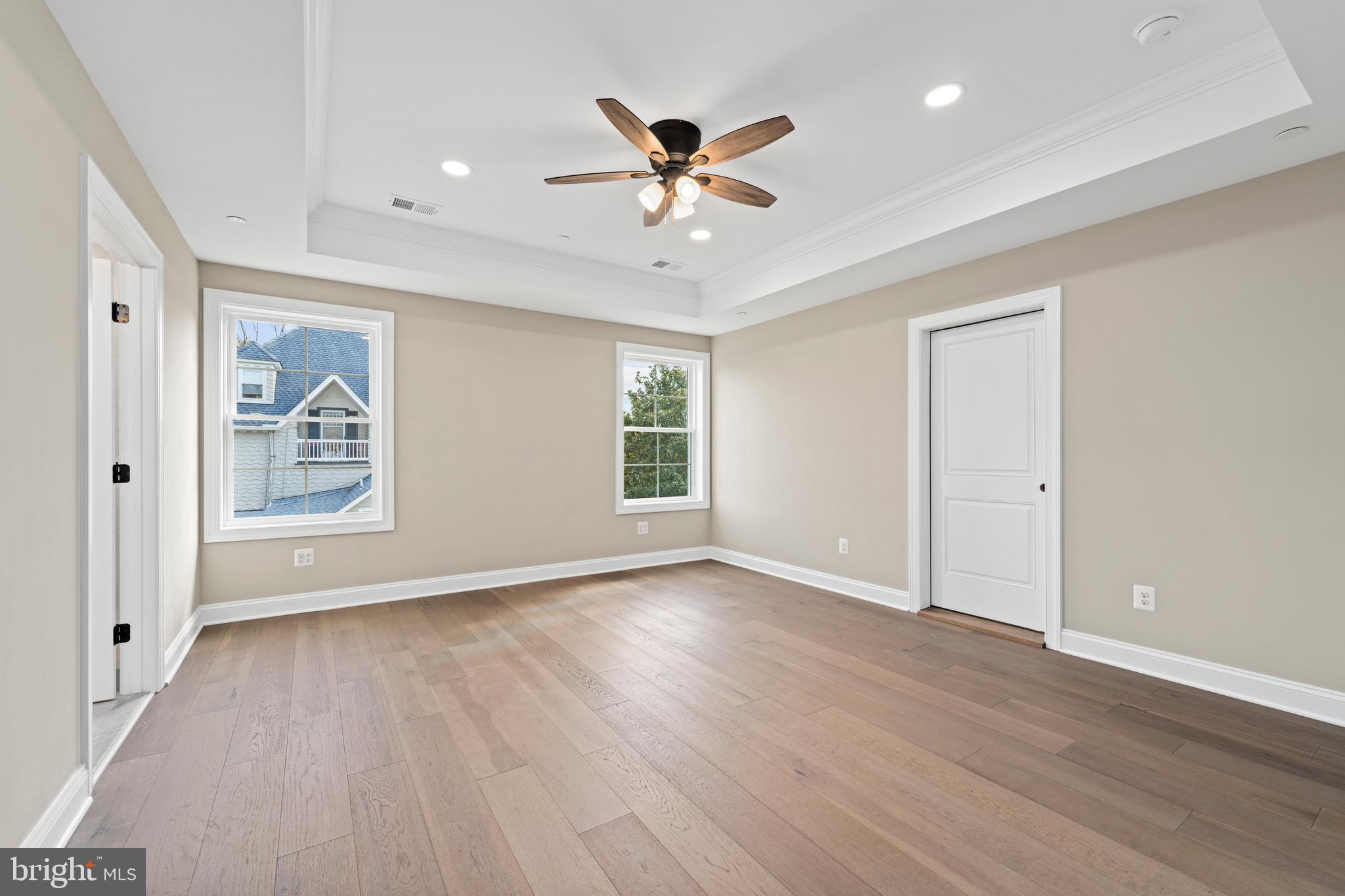 Stem Rd Union Bridge Union Bridge, MD 21791 - Photo 24 of 72 an empty room with wooden floor ceiling fan and windows