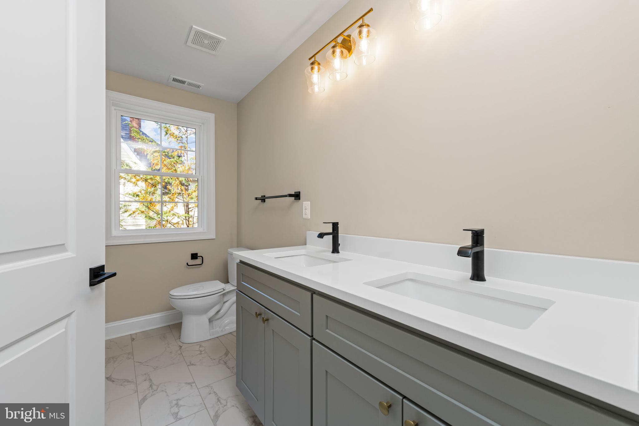 Stem Rd Union Bridge Union Bridge, MD 21791 - Photo 30 of 72 a bathroom with a sink a toilet and a window