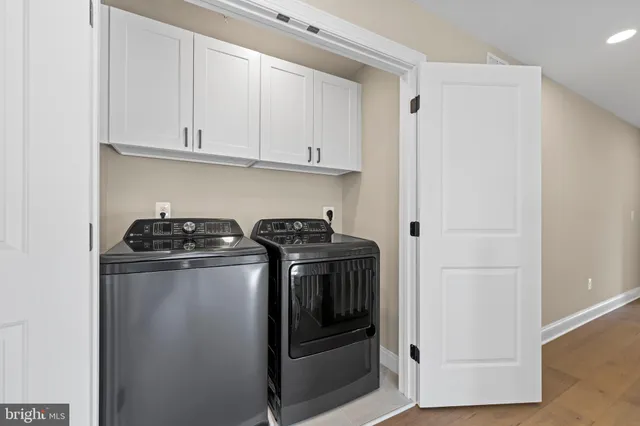 a backyard of a house with yard and outdoor seating