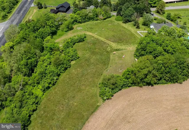 a view of a big yard with furniture