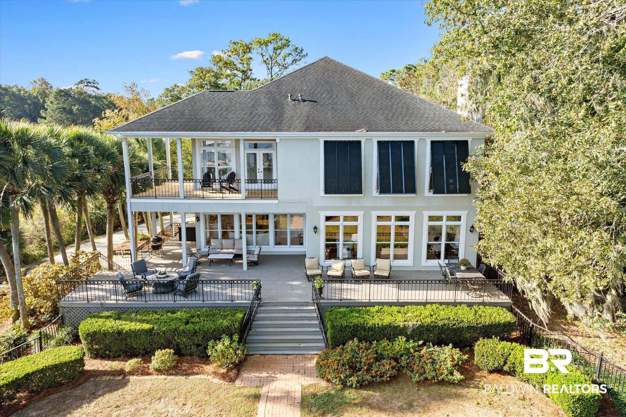 4930 River Trace Theodore, AL 36582 - Photo 35 of 57 Rear view of house featuring a patio, a wooden deck, and an outdoor hangout area