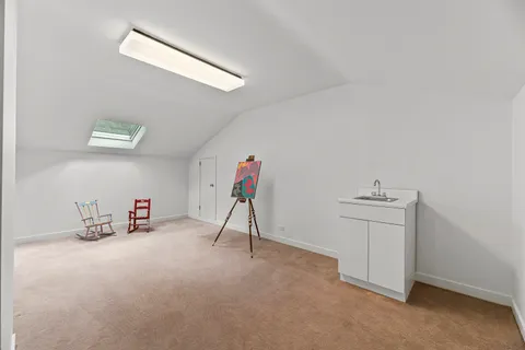 a view of a storage and utility room with a washer and dryer