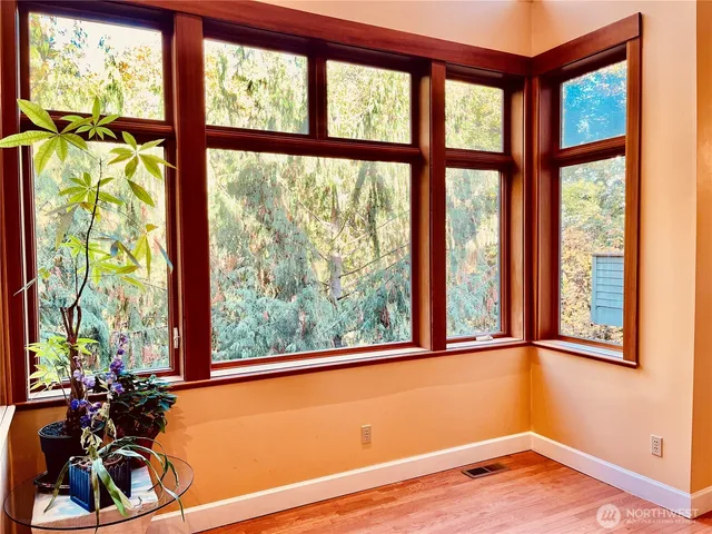 a view of a room with a large window