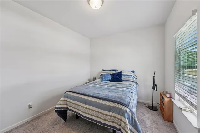 a view of a swimming pool with a yard