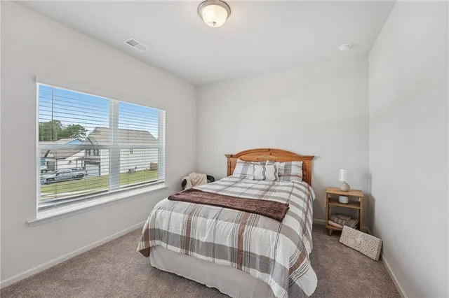 a front view of house with yard and seating area