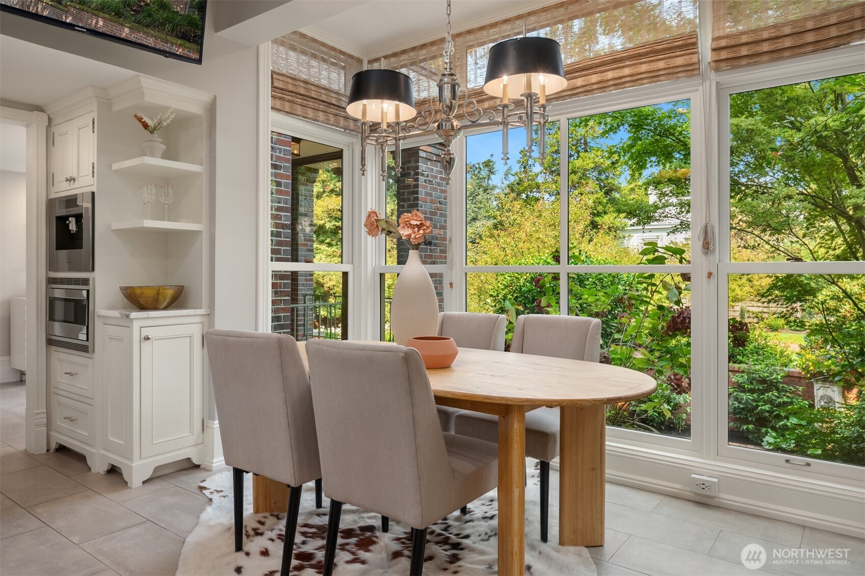 718 East Aloha Street, Unit 10 Seattle, WA 98102 - Photo 16 of 40 a view of a dining room with furniture window and outside view