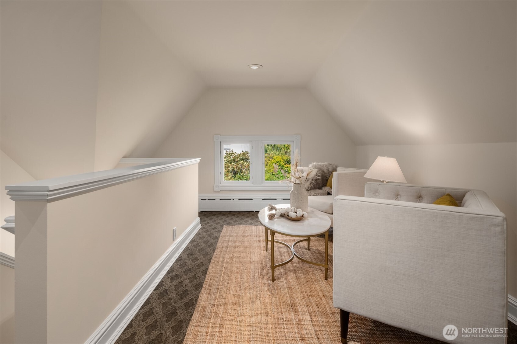 718 East Aloha Street, Unit 10 Seattle, WA 98102 - Photo 36 of 40 a living room with furniture and a window