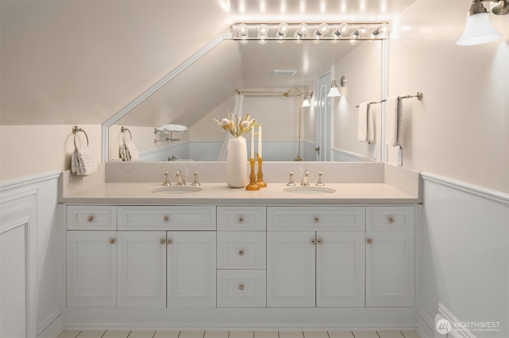 718 East Aloha Street, Unit 10 Seattle, WA 98102 - Photo 38 of 40 a bathroom with a double vanity sink and mirror