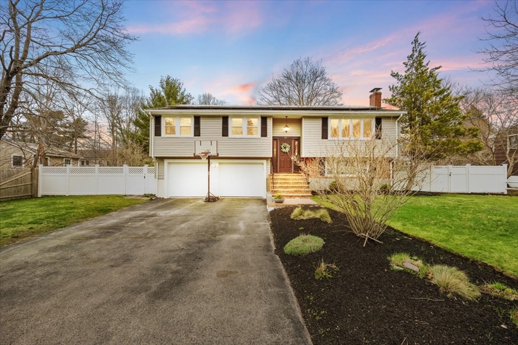 21 Redman Road Canton, MA 02021 - Photo 1 of 40 a front view of a house with garden
