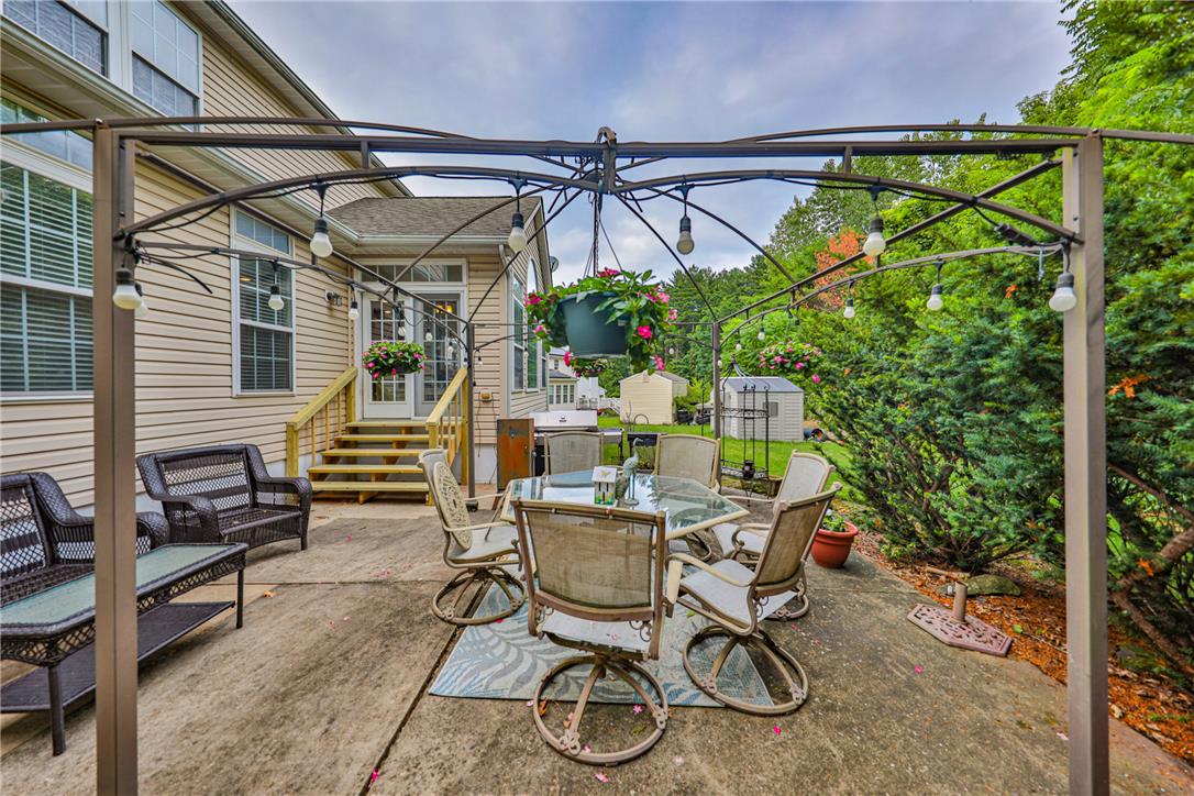 138 Clover Hollow Road Easton, PA 18045 - Photo 82 of 95 A private backyard oasis with an inviting patio, perfect for outdoor entertaining.