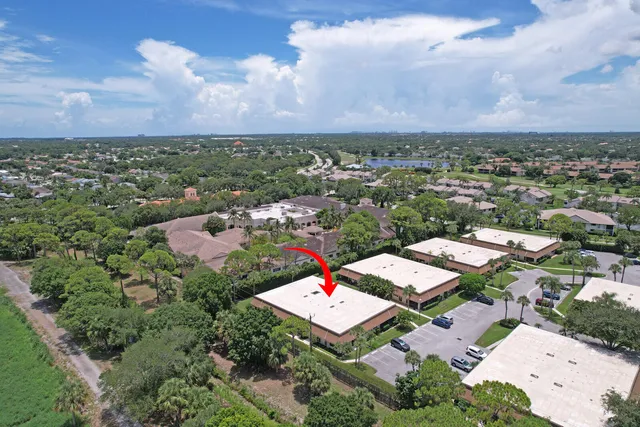 an aerial view of a houses with outdoor space