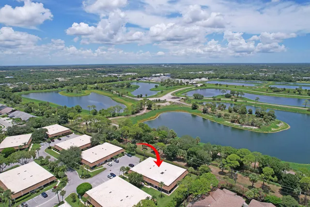 an aerial view of a house with a garden