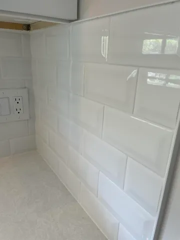 a view of small space with racks on the wall