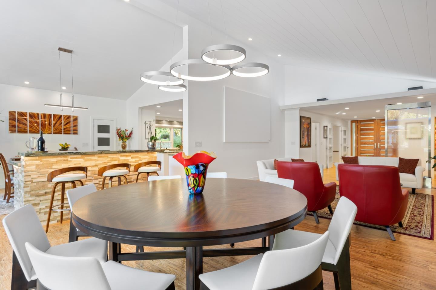 89 Selby Lane Atherton, CA 94027 - Photo 17 of 59 a view of a dining room with furniture and wooden floor