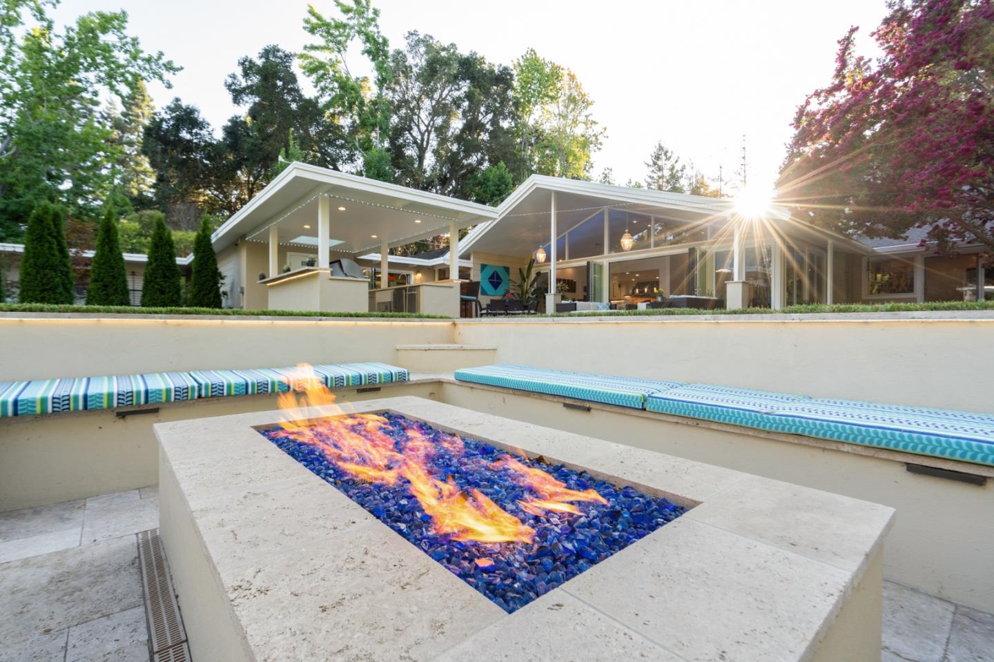 89 Selby Lane Atherton, CA 94027 - Photo 20 of 59 a front view of a house with a yard and lake view