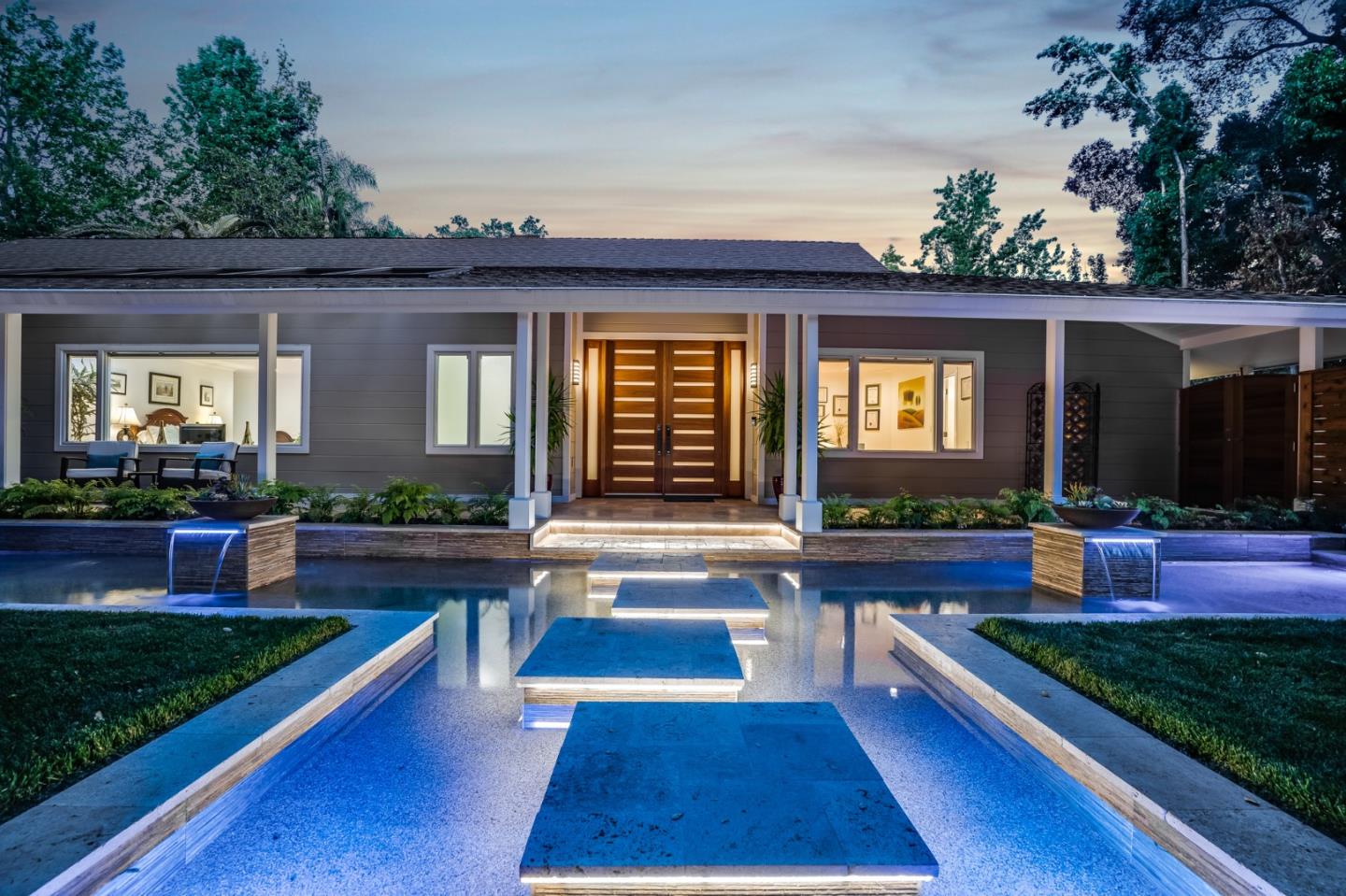 89 Selby Lane Atherton, CA 94027 - Photo 2 of 59 a front view of house with yard outdoor seating and green space