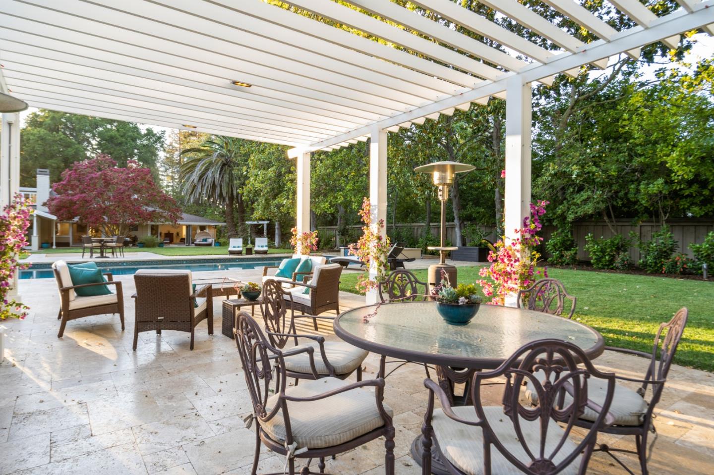 89 Selby Lane Atherton, CA 94027 - Photo 31 of 59 a dining area with furniture and outdoor view