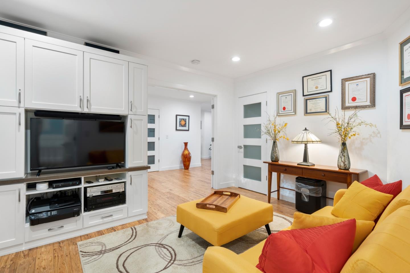 89 Selby Lane Atherton, CA 94027 - Photo 36 of 59 a living room with furniture and a flat screen tv