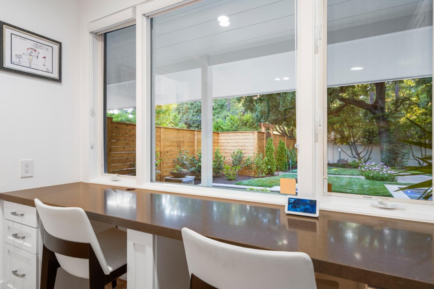 89 Selby Lane Atherton, CA 94027 - Photo 37 of 59 a view of a dining room with furniture large windows and wooden floor