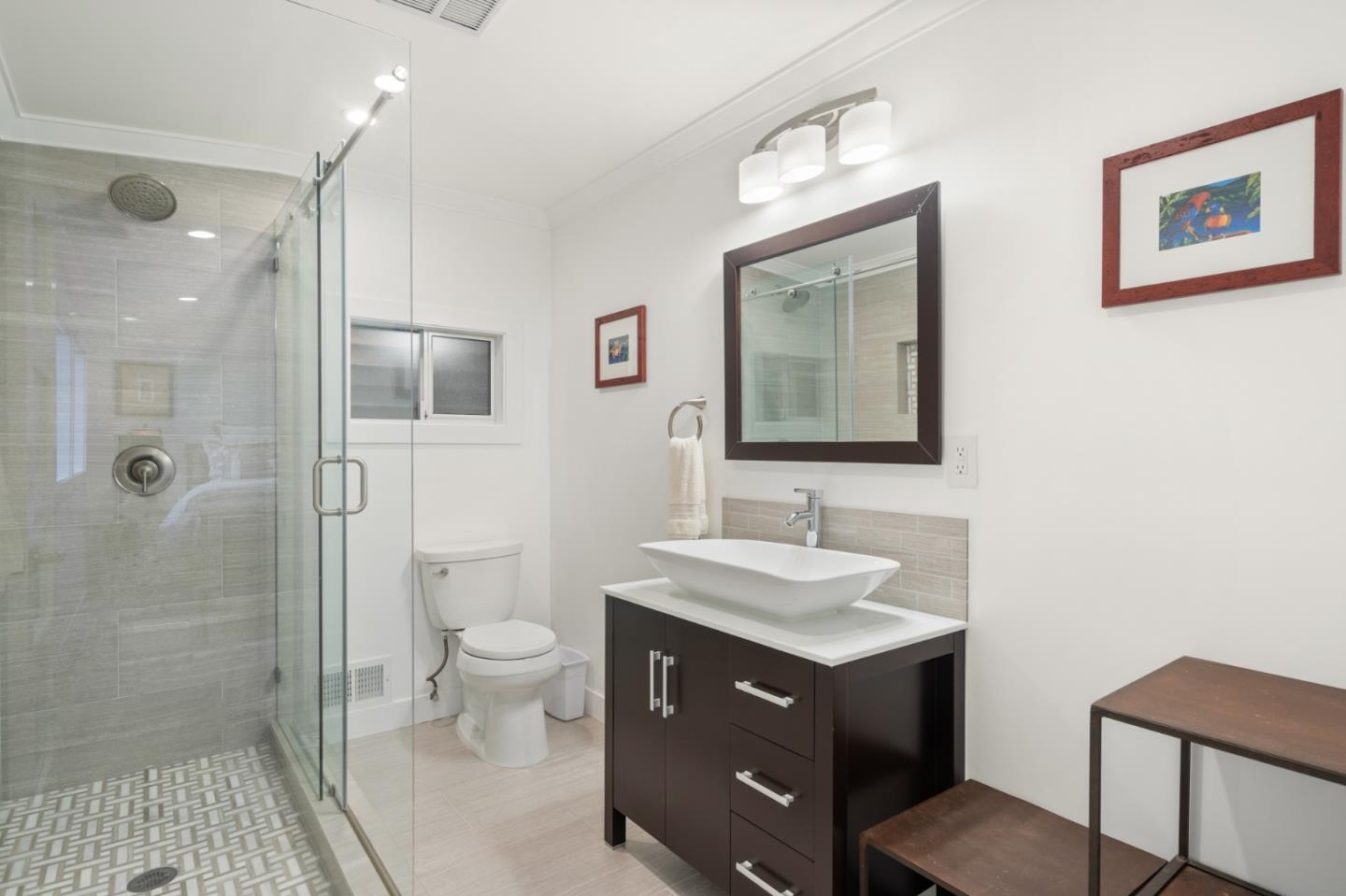 89 Selby Lane Atherton, CA 94027 - Photo 41 of 59 a bathroom with a sink vanity granite toilet and a mirror