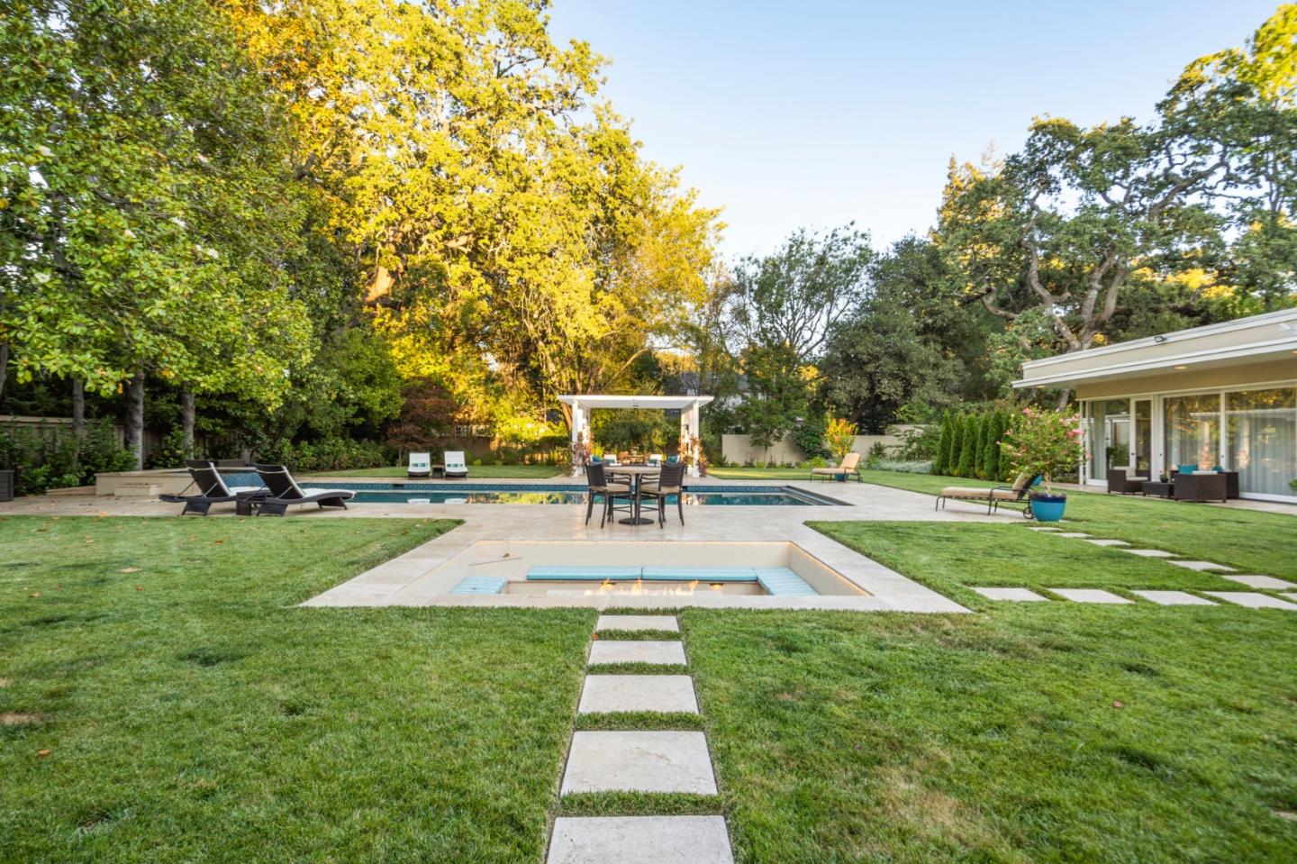 89 Selby Lane Atherton, CA 94027 - Photo 47 of 59 a view of a house with a yard