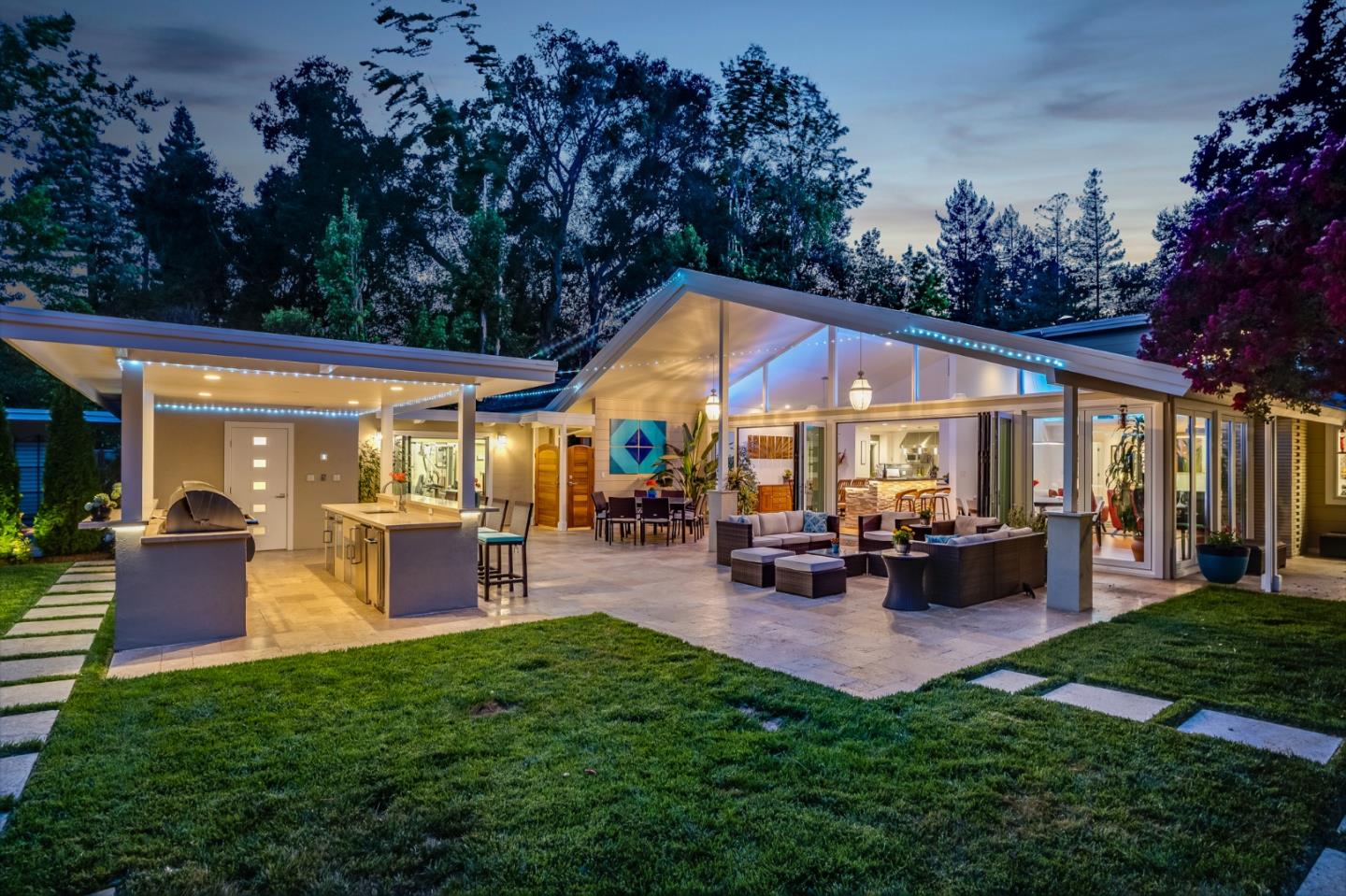 89 Selby Lane Atherton, CA 94027 - Photo 56 of 59 a view of a house with patio and a garden