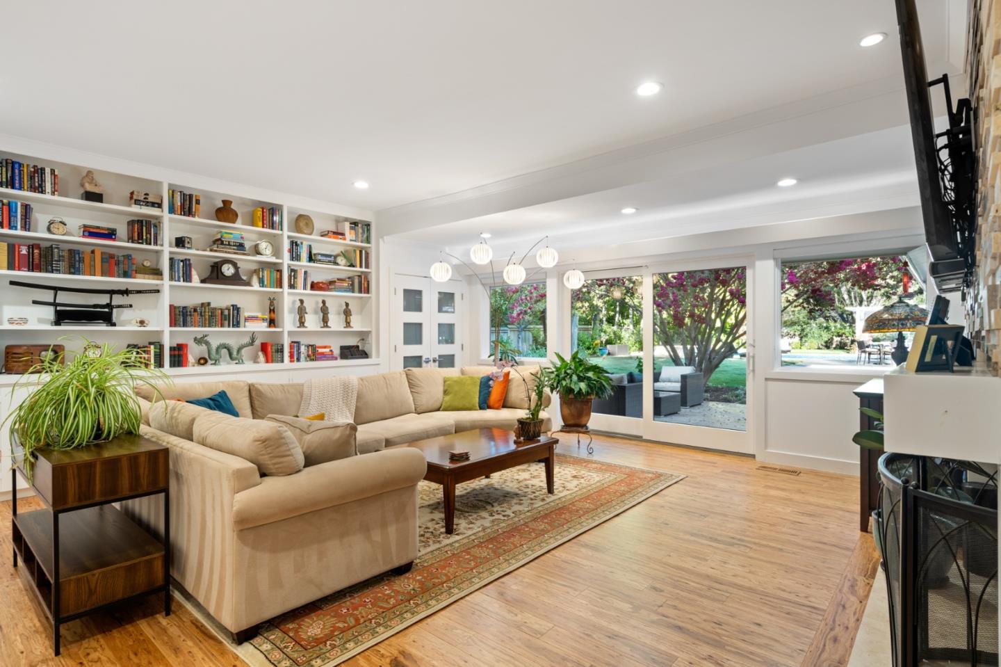 89 Selby Lane Atherton, CA 94027 - Photo 10 of 59 a living room with furniture and a potted plant
