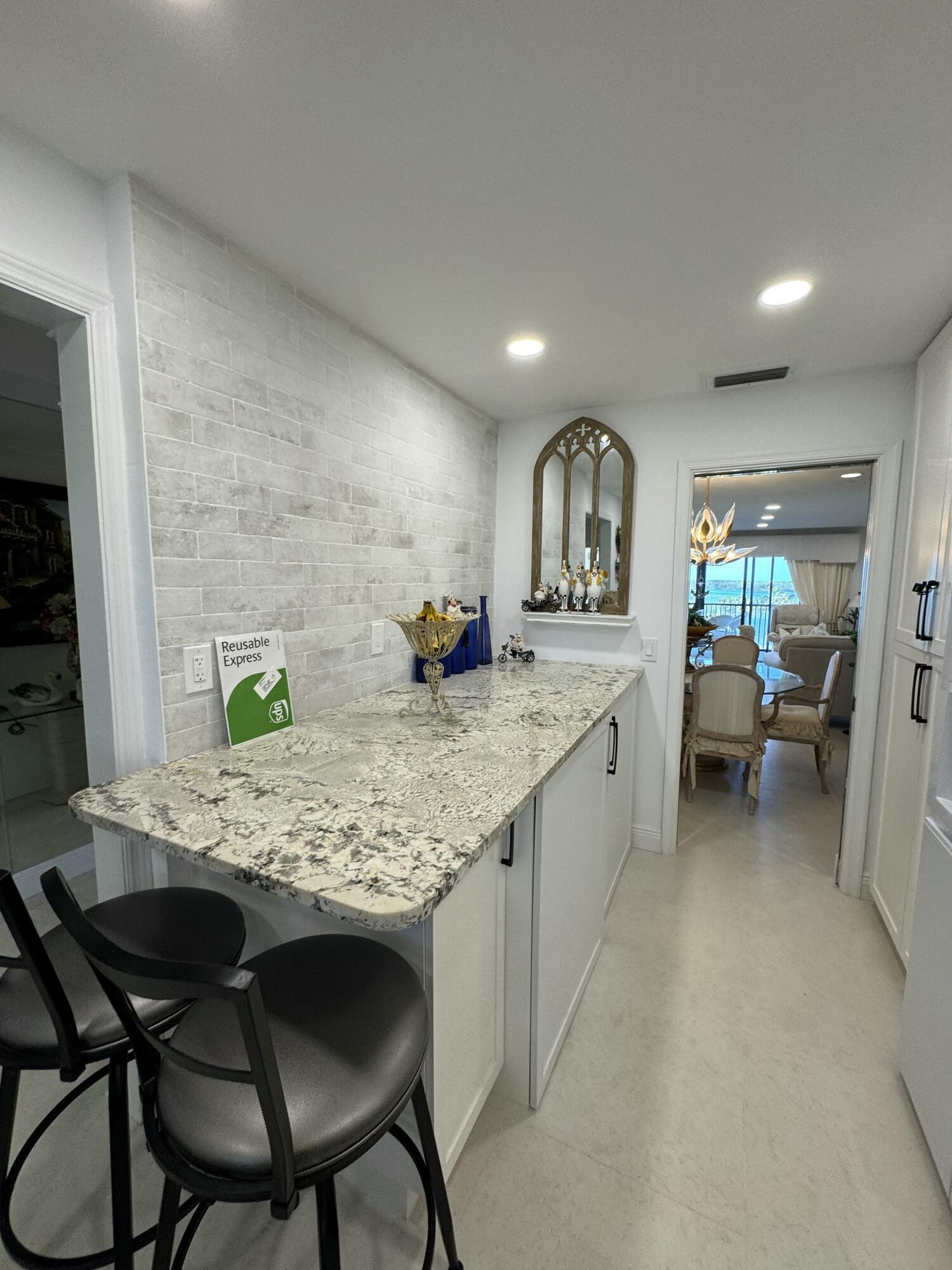 200 Intracoastal Place, Unit 404 Jupiter, FL 33469 - Photo 18 of 95 granite bar eat in kitchen