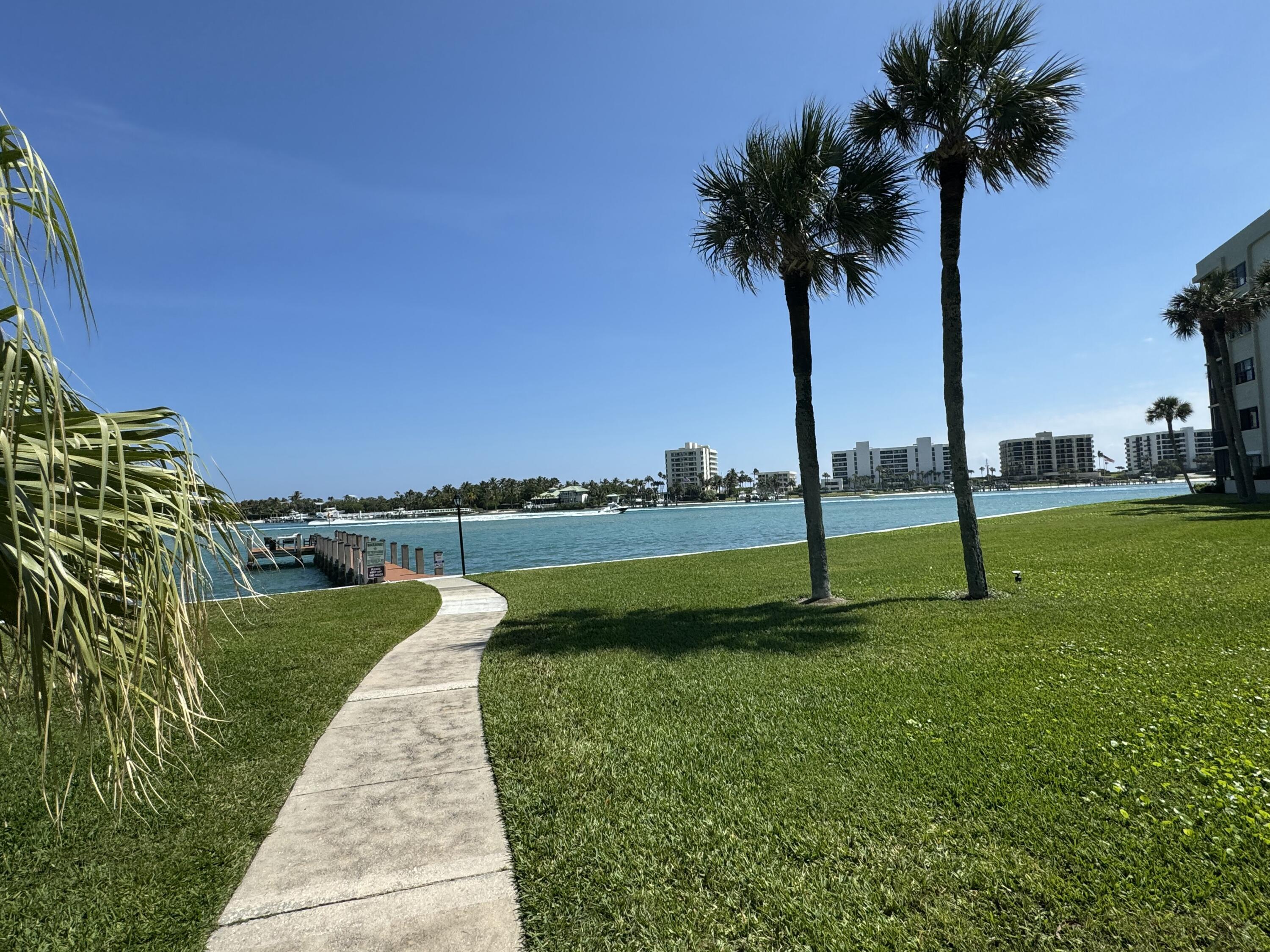 200 Intracoastal Place, Unit 404 Jupiter, FL 33469 - Photo 38 of 95 walkway to back