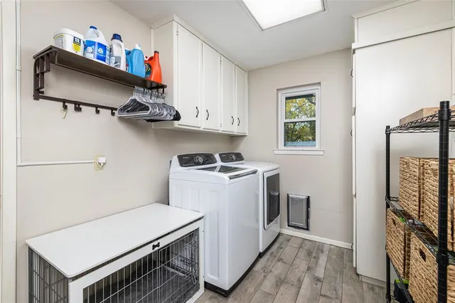 a view of a house with a yard porch and sitting area
