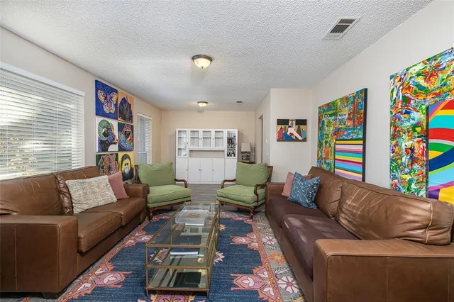a living room with furniture and a couch