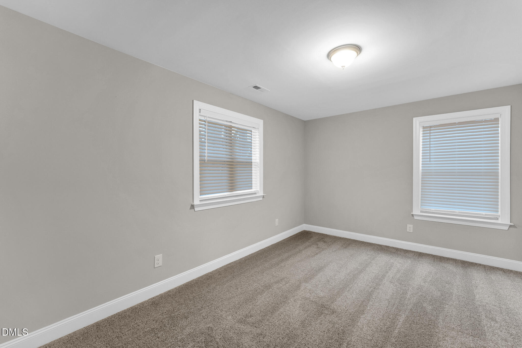 928 Barringer Drive Raleigh, NC 27606 - Photo 19 of 40 an empty room with a window