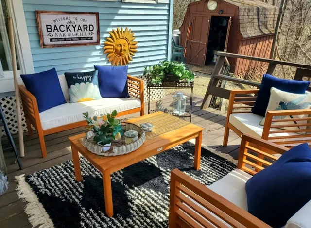 swimming pool view with a seating space