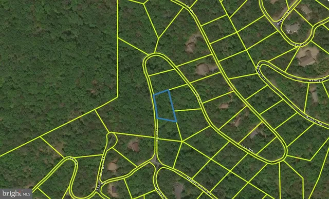 an empty room with a sink and a glass door