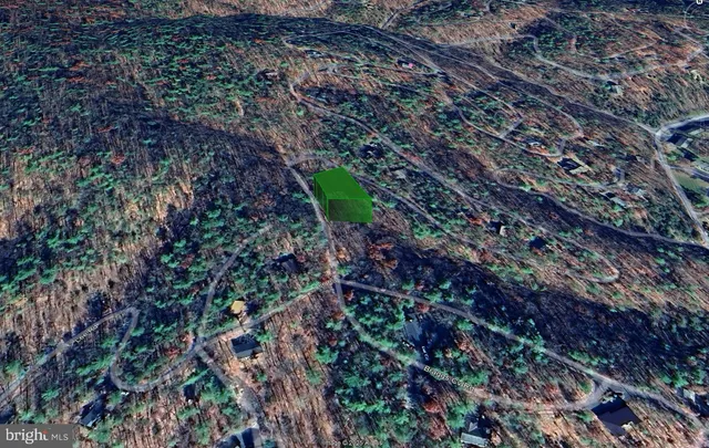 a aerial view of house with a yard