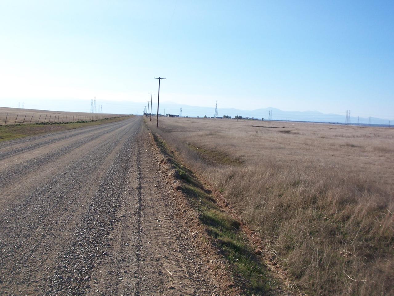 Lot 10 Ohm Road Red Bluff, CA 96080 - Photo 5 of 7 a view of a dry yard with wooden fence