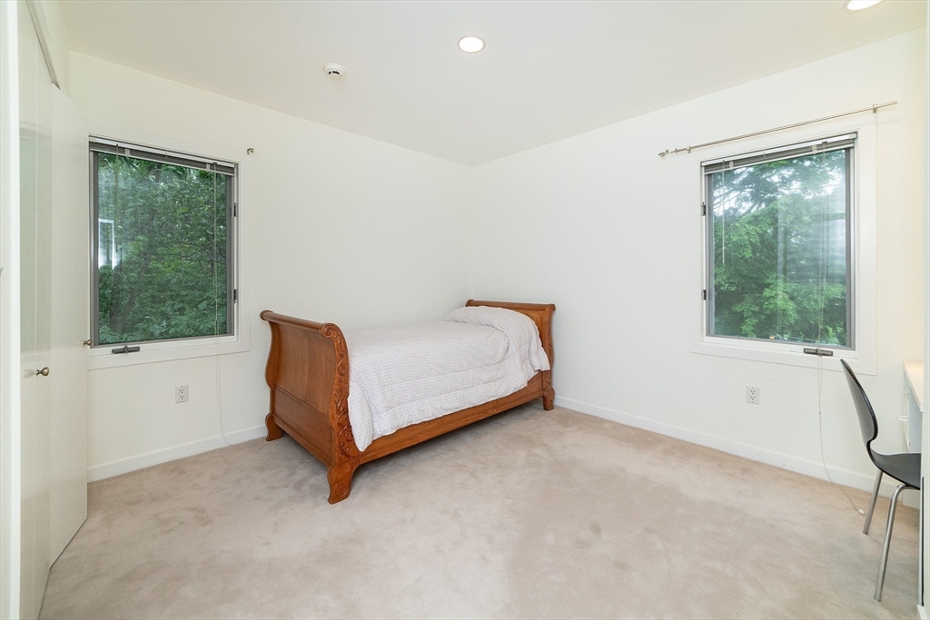 50 Bellingham Road Brookline, MA 02467 - Photo 22 of 31 a room with a bed and a window