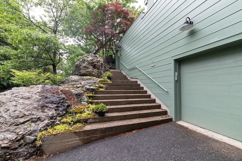 50 Bellingham Road Brookline, MA 02467 - Photo 24 of 31 a view of a house with a yard