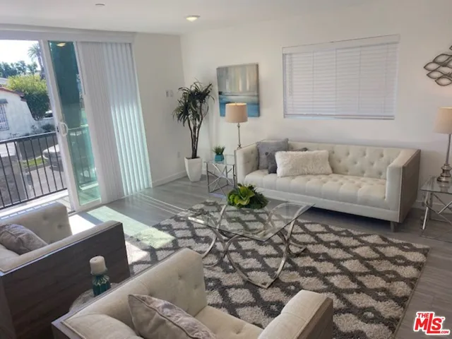 a living room with furniture and a couch