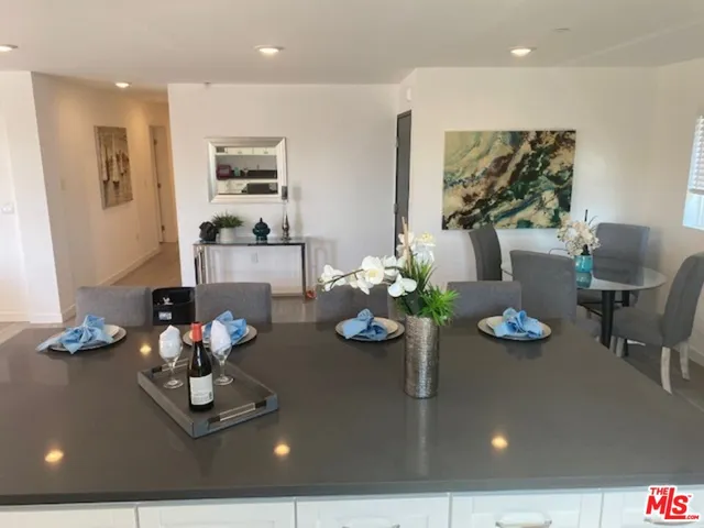 a view of dining room with furniture and wooden floor