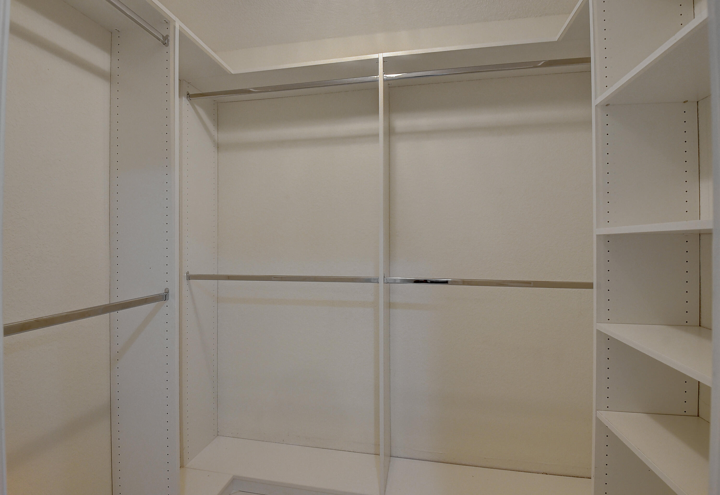 824 Foxpointe Circle Delray Beach, FL 33445 - Photo 17 of 36 Primary BR Walk in closet