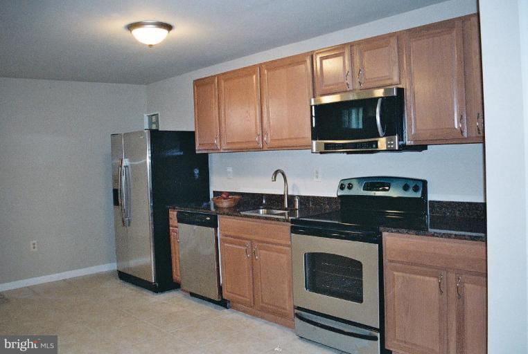 13209 Rippling Brook Drive Silver Spring, MD 20906 - Photo 14 of 18 View of second kitchen on lower level