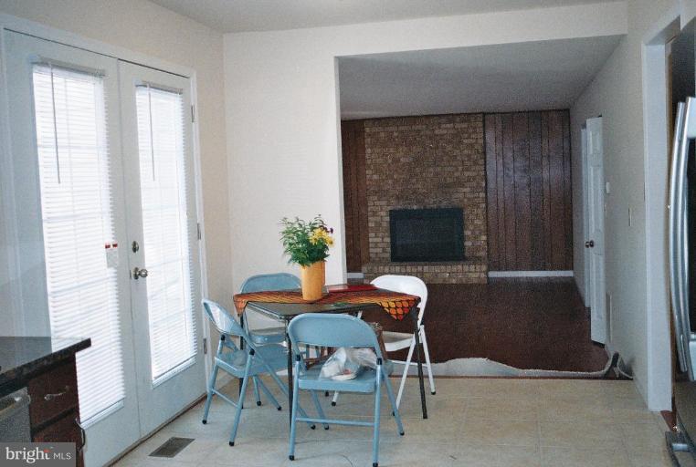 13209 Rippling Brook Drive Silver Spring, MD 20906 - Photo 4 of 18 Breakfast area with view of Family room, fireplace