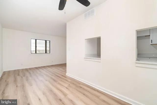 an empty room with windows