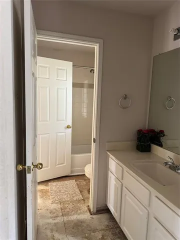 a bathroom with a sink and a vanity