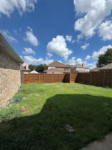 a view of a garden with a big yard
