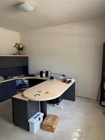 a room with furniture and a flat screen tv