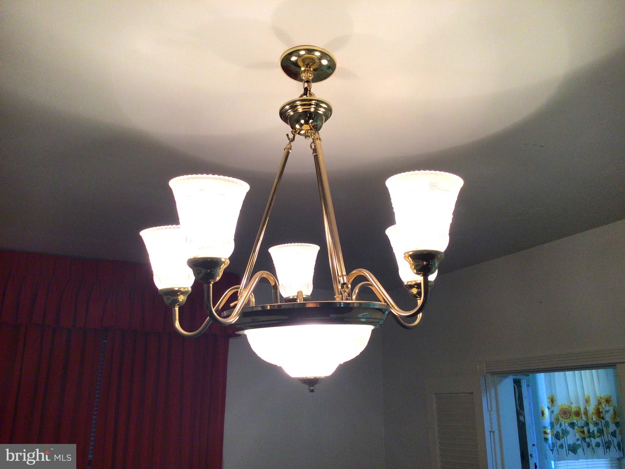 1547 Lochwood Road Baltimore, MD 21218 - Photo 16 of 30 Five-Bulb Chandelier in Dining Room