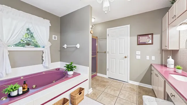 a room with furniture and a potted plant