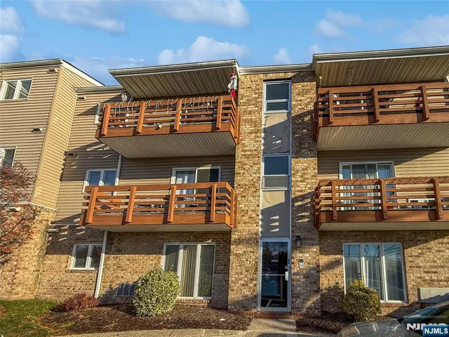 a view of a building with retail shops